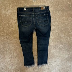 BKE Payton mid-rise capri, dark blue, semi-distressed.